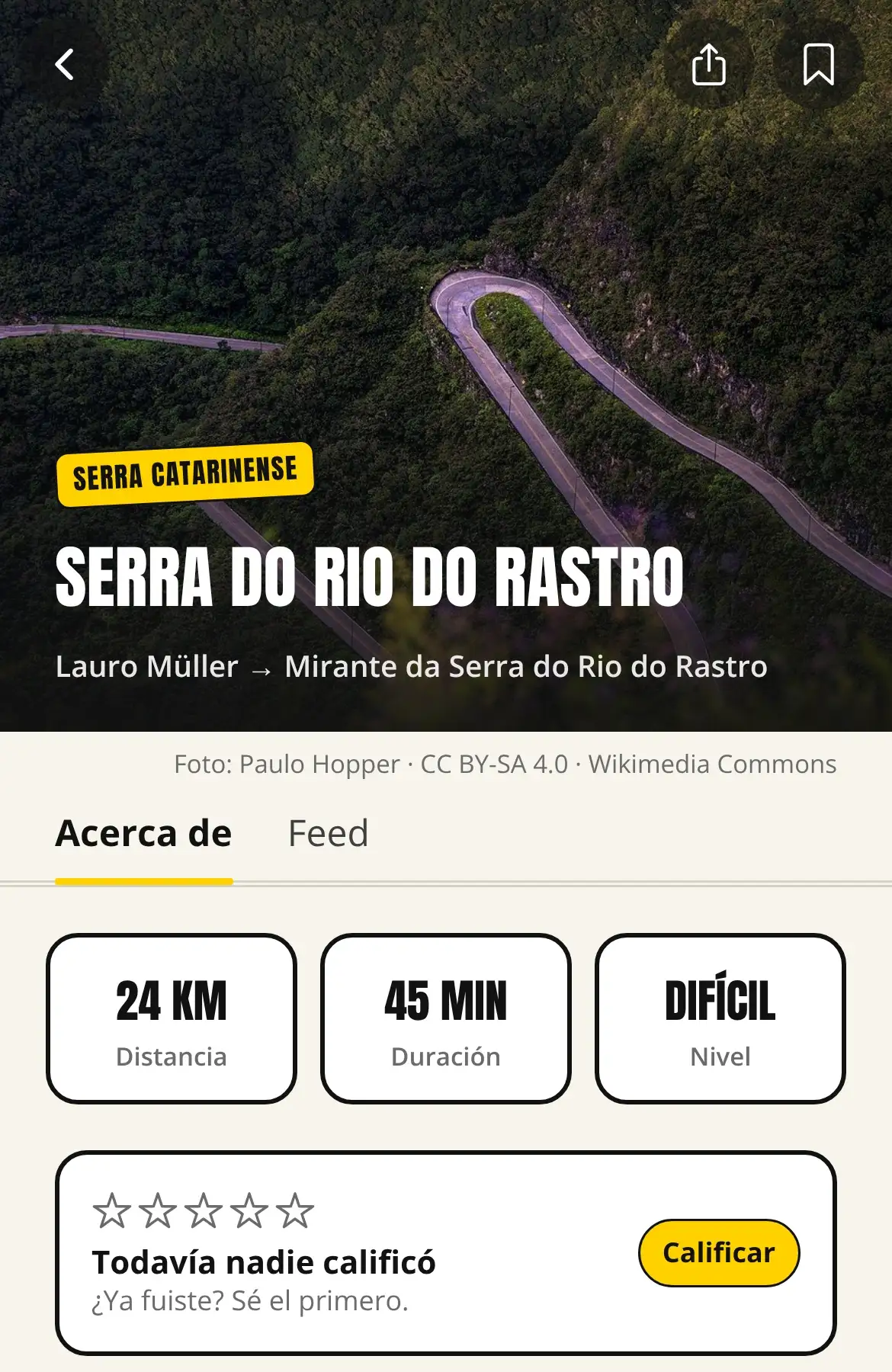 Pantalla de la ruta Serra do Rio do Rastro en la app: foto de la carretera, 24 km, 45 minutos, nivel difícil.